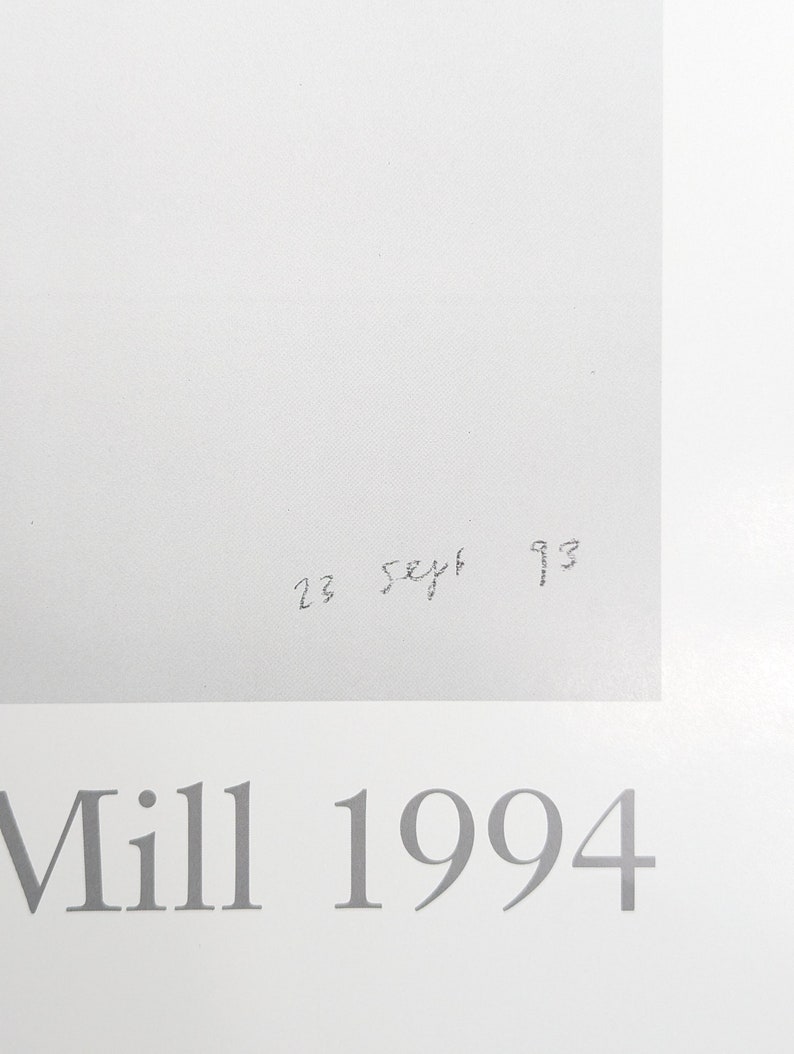 May include: A white background with the text "Mill 1994" in gray lettering. The number "23" and the word "Sept" are handwritten in black ink.