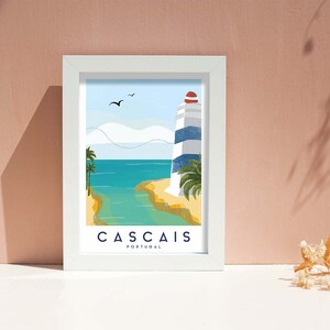 May include: A framed art print featuring a coastal scene with a lighthouse. The illustration depicts a blue and white striped lighthouse, palm trees, and the text "CASCAIS PORTUGAL" in a white frame. The background is a light blue sky and turquoise water.