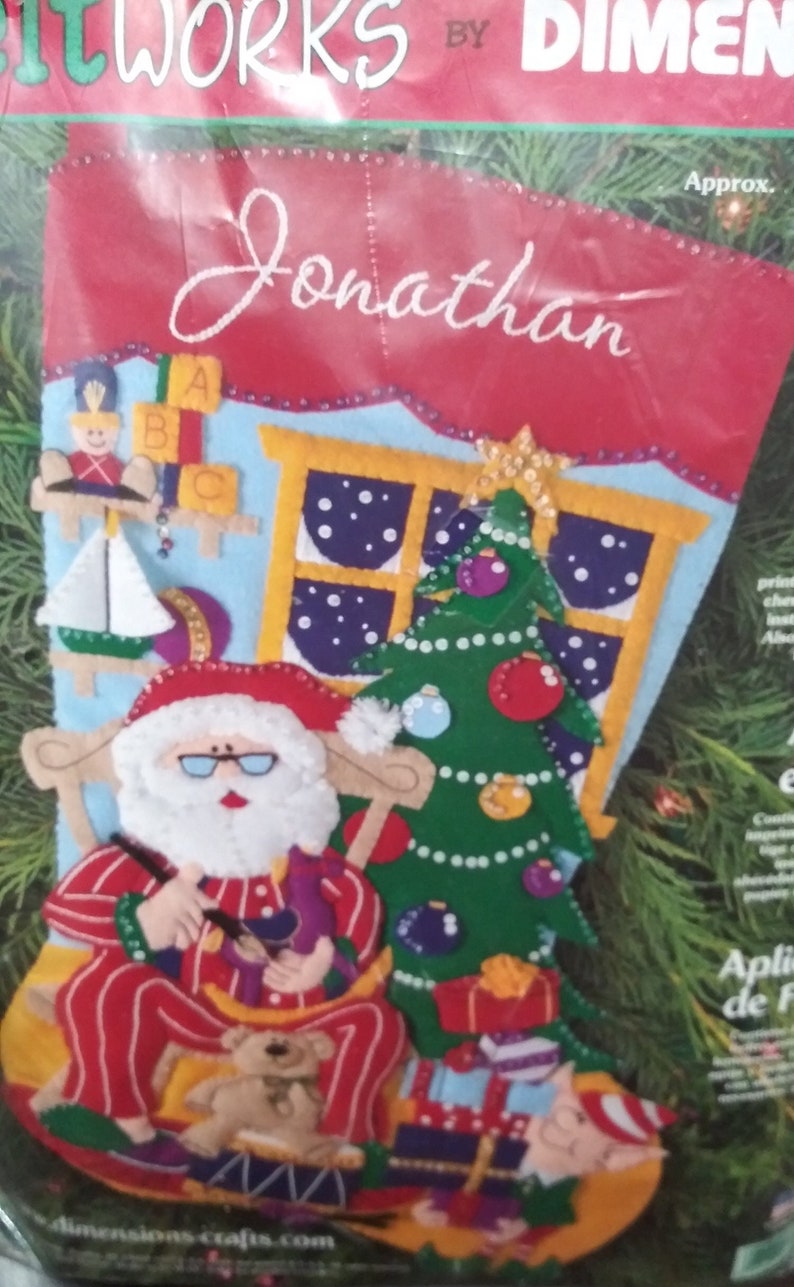 May include: A white ceramic mug with a black handle and the text "But First, Coffee" in a bold, black font. The mug is sitting on a wooden surface. The mug appears to be 12 ounces.