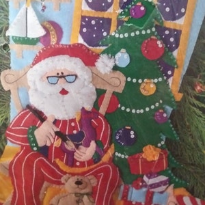 May include: A handmade wooden sign with the text "Welcome" in a handwritten style. The sign is painted white with a distressed finish, and a small green leaf is attached to the top. The sign is designed for home decor.