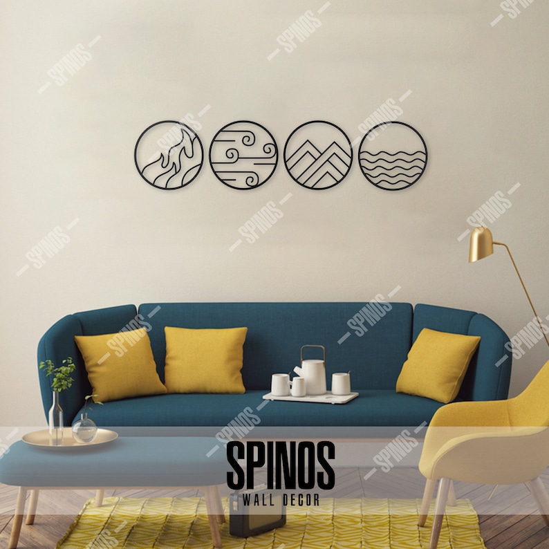 May include: Four black metal wall decor pieces with different nature-inspired designs. The designs include a wave, wind, mountains, and water. The decor is displayed on a white wall above a blue couch with yellow throw pillows.