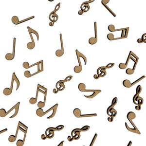 Forme artigianali in MDF tagliate al laser con note musicali