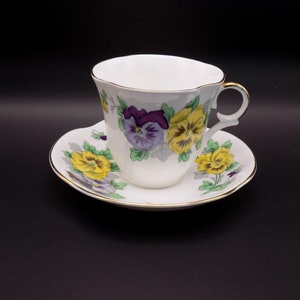 Victoria C & E &quot;Pansy&quot; Teacup and Saucer- Hand Painted Yellow and Purple Floral - February Birthday- Staffordshire Bone China- 1930&#39;s