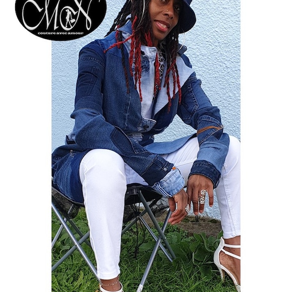 Maison du Natali Women’s Up-cycled Blue Denim Collection Gothia long-sleeve coat with coat tail, button fastening and notched lapel.  Size12