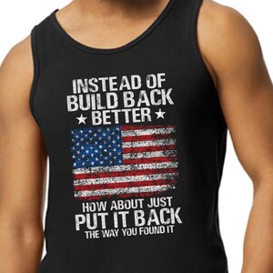 This is a picture of a man wearing a USA flag shirt. The picture is of a distressed American flag, a distressed USA flag.