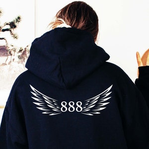 May include: Black hooded sweatshirt with white wings and the number 888 printed on the back.