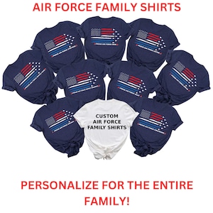 May include: A set of navy blue t-shirts with an American flag design and the text "Proud Air Force" with different family member titles. The shirts are arranged in a circle with a white t-shirt in the center that says "Custom Air Force Family Shirts".