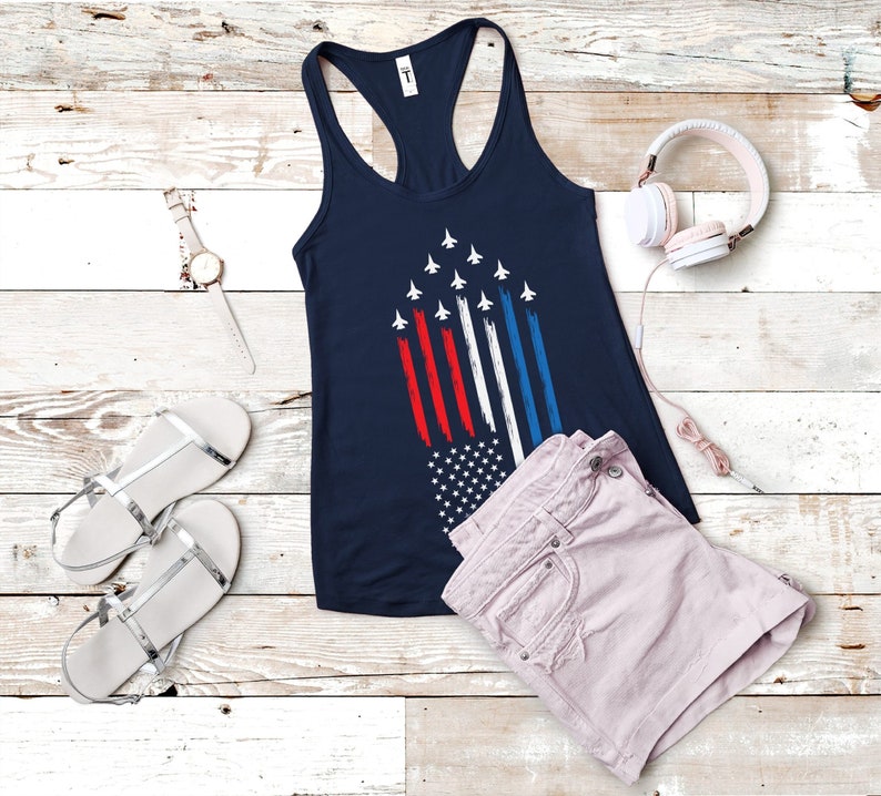 This is a Women's Patriotic Tank Top with the a Blue Angel Flyover. It is a 4th Of July Racerback Tank for Ladies. This tank is a Patriotic 4th Of July Tank.