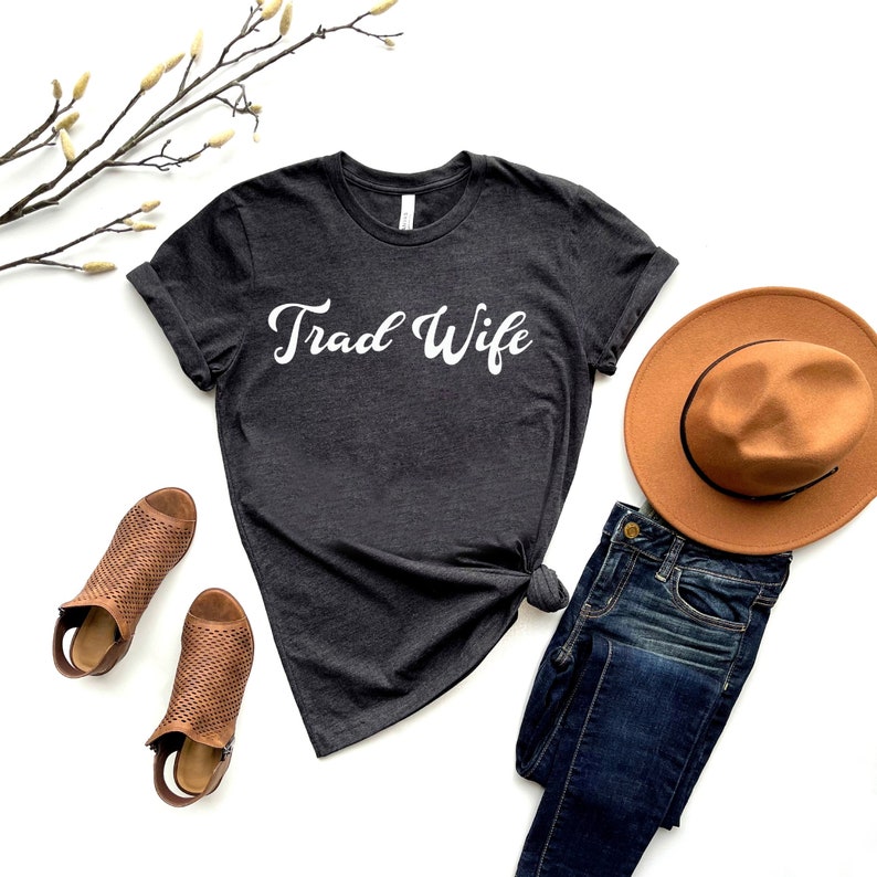 This is a picture of a traditional wife wearing a trad wife t shirt.
