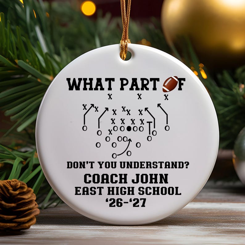Personalized football coach ceramic Christmas ornament displayed in gift box with golden hanging string, custom coach name, school and season, football playbook design, team coach thank you gift, holiday keepsake and end of season gift, Mom’s Next Adventure.