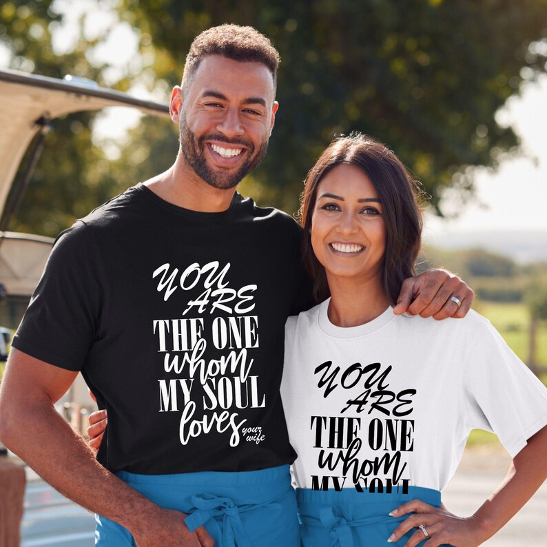 Faith based matching shirts for Christian couples, husband and wife wearing religious tees