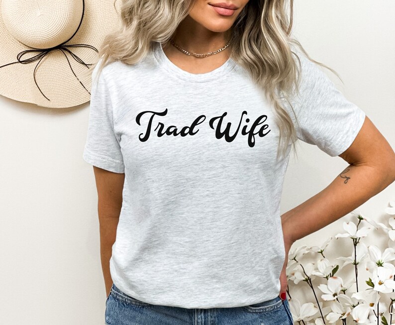 This is a picture of a traditional wife wearing a trad wife t shirt.