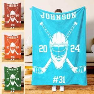 Aqua hockey blanket with personalized name and number – Moms Next Adventure