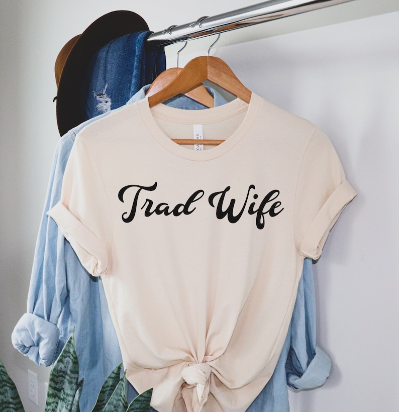 This is a picture of a traditional wife wearing a trad wife t shirt.