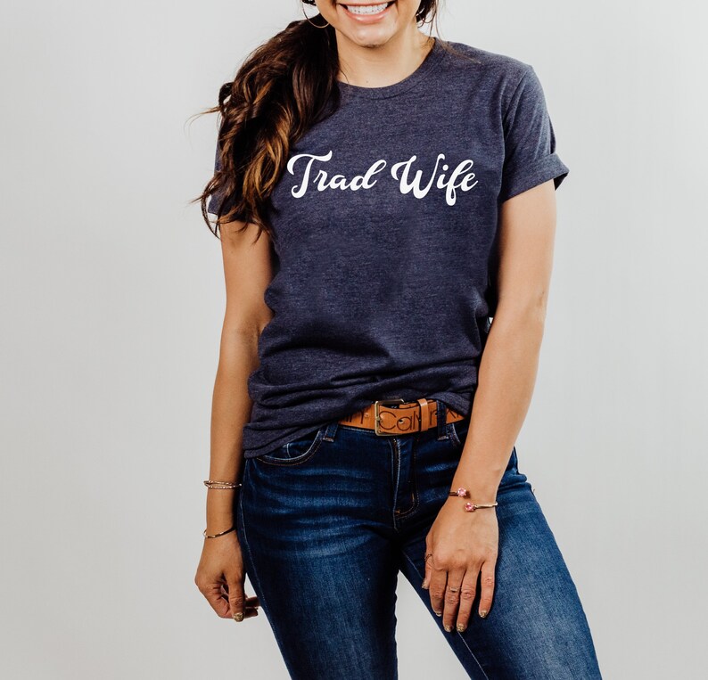 This is a picture of a traditional wife wearing a trad wife t shirt.