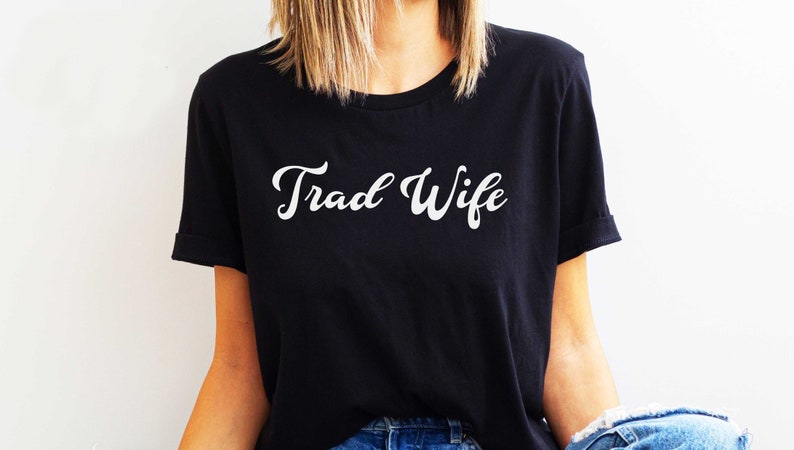This is a picture of a traditional wife wearing a trad wife t shirt.