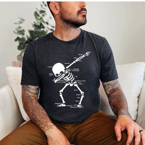 Anatomy skull t-shirt with labeled bones and ligaments. Gift for medical or nursing students with labeled bones art. Detailed human skeleton skull shirt design