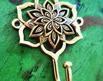 Handcrafted lotus flower wall hook in aged metal