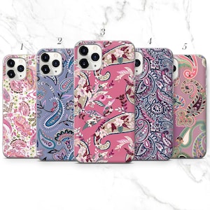 May include: Five smartphone cases arranged in a row, each featuring a distinct paisley and floral pattern. The cases display various color palettes including white, light blue, pink, dark blue, and muted green, all with triple camera cutouts.