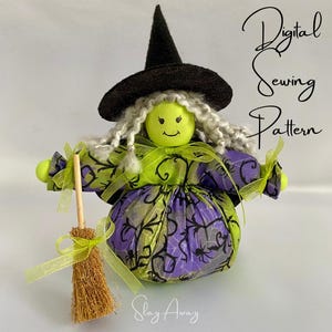 May include: A green witch doll with a black hat and white hair, holding a brown broom with a green ribbon. The doll is wearing a purple and green dress with a spiderweb pattern. The text "Digital Sewing Pattern" is written in cursive above the doll.
