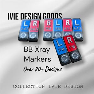 May include: A collection of rectangular X-ray markers featuring red and blue backgrounds with white lettering. Each marker displays an L or R, along with codes like A43, RM, or PW, and a circular icon with three dots at the bottom of each piece.