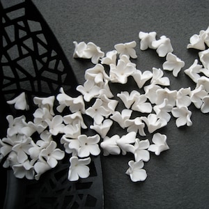KEOKER Moldes de arcilla polimérica de flores, 1 molde de arcilla  polimérica de margaritas para fabricación de joyas, moldes de arcilla en  miniatura