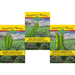 May include: Three seed packets for heirloom chile peppers. The packets are yellow with the words "Peppers of the World" and feature images of green peppers. The packets are labeled "Numex Heritage 6-4", "Big Jim Legacy", and "Hatch Green Hot".