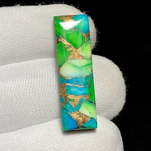 Superb Quality Peacock Dahlia Turquoise Cabochon, Showcasing Rich Tones Of Blue Green With A Floral Matrix, 31 x 10 x 4MM, 17.70ct.