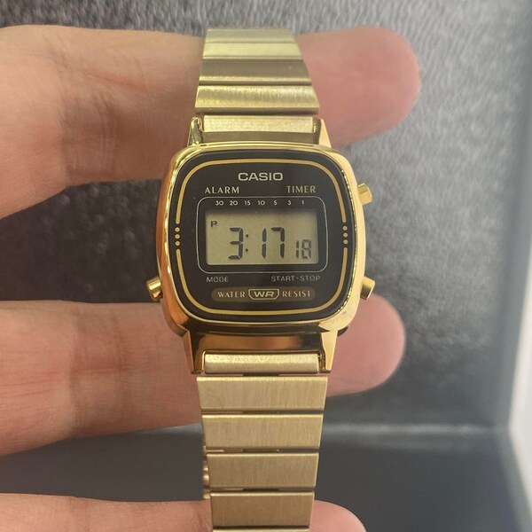 Casio extra small size for teens/ladies/adult. Lightweight, New Battery Inside. Size is about a quarter dollar. Brand New item