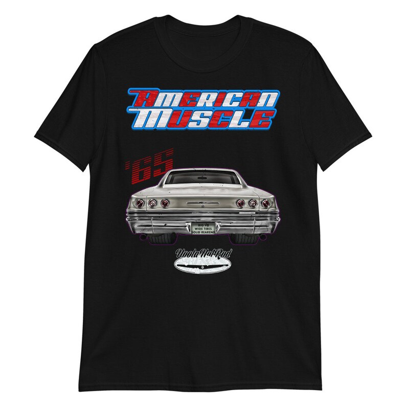 May include: A black t-shirt with a white and red "American Muscle" graphic and a silver 1965 Chevrolet Impala. The car is shown from the rear and has the text "Uncle Mat's Rod" on the back.