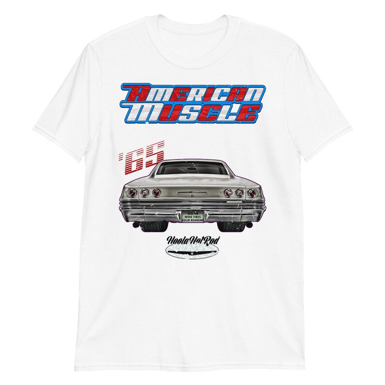May include: White t-shirt with a vintage-style graphic of a silver 1965 Chevrolet Impala with the text "American Muscle" and "Hoola Hot Rod".