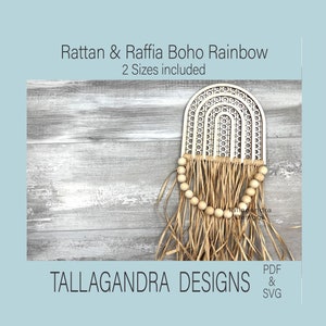 May include: A wooden rainbow with a raffia fringe and wooden beads hanging from the bottom. The rainbow is on a light gray wood background. The text "Rattan & Raffia Boho Rainbow" and "2 Sizes included" is above the rainbow. The text "TALLAGANDRA DESIGNS" is below the rainbow. The text "PDF & SVG" is in the top right corner of the image.