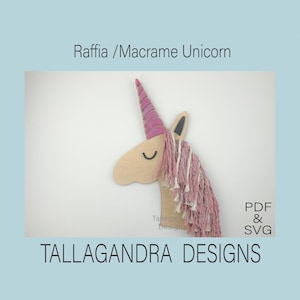 May include: A wooden unicorn head with a pink and white yarn mane and a pink and white yarn horn. The unicorn is on a white background. The text "Raffia / Macrame Unicorn" is at the top of the image. The text "TALLAGANDRA DESIGNS" is at the bottom of the image. The text "PDF & SVG" is in the bottom right corner of the image.