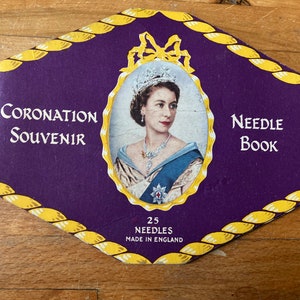 Vintage 1953 Queen Elizabeth II coronation portrait needle book with pop up coronation coach