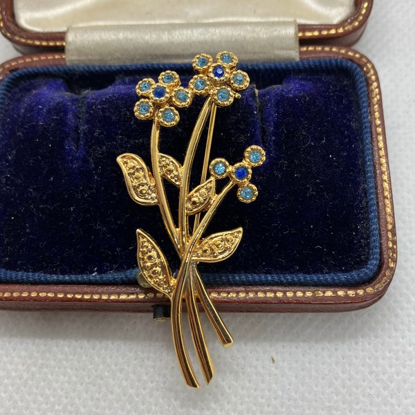 Pretty vintage 1970s gold marcasite and blue paste stone blue flower floral brooch by Movitex - signed