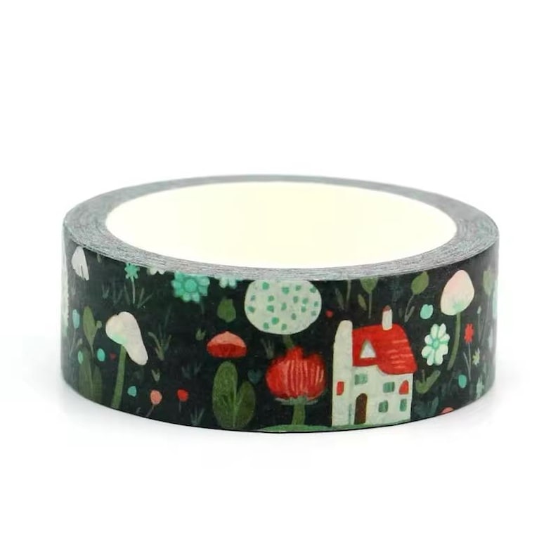 May include: A roll of decorative washi tape featuring a whimsical forest scene. The tape has a dark background with illustrations of mushrooms, flowers, and a small house with a red roof. The tape is perfect for scrapbooking and crafts.