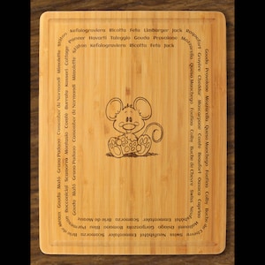 May include: A wooden cutting board with a cartoon mouse illustration. The board is engraved with a list of different types of cheese in English, French, Spanish, and Italian.