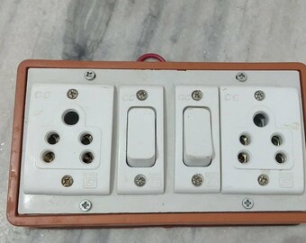 Two socket switch wall and electricity board
