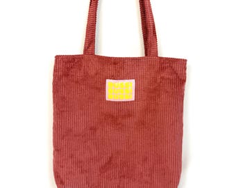 Statement-Cordbeutel zum Wenden