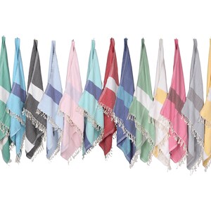 May include: A collection of 14 colorful striped towels with fringe edges hanging on a white background. The towels are in various colors, including red, blue, green, yellow, pink, and gray.