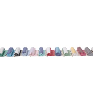 May include: A row of 15 rolled up towels in various colors, including black, pink, green, blue, white, gray, yellow, and red.