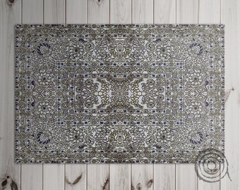 Könnte beinhalten: Rechteckiger Teppich mit einem aufwendigen Blumenmuster in Weiß, Braun und Blau. Der Teppich hat ein zentrales Medaillon-Design und einen detaillierten Rand. Das Design ist symmetrisch und scheint maschinell hergestellt zu sein.