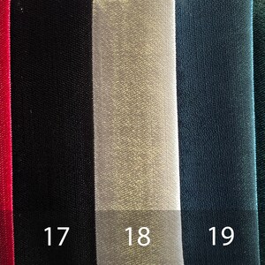 May include: A close-up of seven fabric swatches in different colors. The swatches are labeled with numbers 15 through 21. The fabric is a velvet texture.