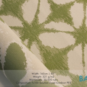 May include: Green and white fabric with a repeating pattern of stylized flowers. The fabric is 65 inches wide and made of 100% solution dyed outdoor polyester. The text "ROK" and "BACOLI" are visible in the image.