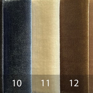 May include: A close-up of eight fabric swatches in different colors, including beige, black, dark blue, light beige, brown, light brown, and green. The swatches are labeled with numbers 8 through 14. The text "ROKiE-31" is visible at the top of the image.