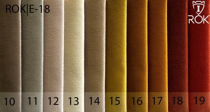 May include: A fabric swatch card displaying 10 different fabric samples. The samples range in colour from light brown to dark red. The card is labelled "ROK E-18" and "ROK".