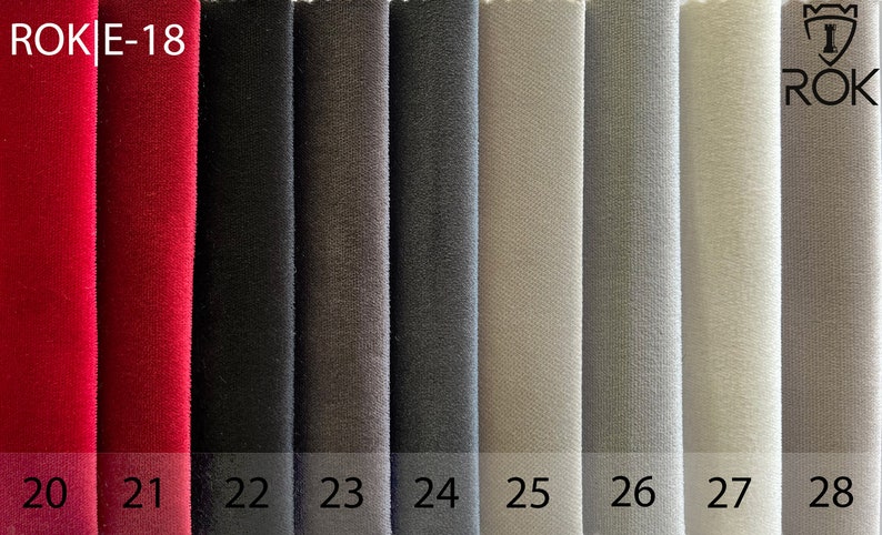 May include: Fabric swatches in eight different colours, including red, black, grey, and beige. The swatches are labelled with numbers 20 through 28. The text "ROK|E-18" is at the top of the image, and the text "ROK" is at the bottom right.