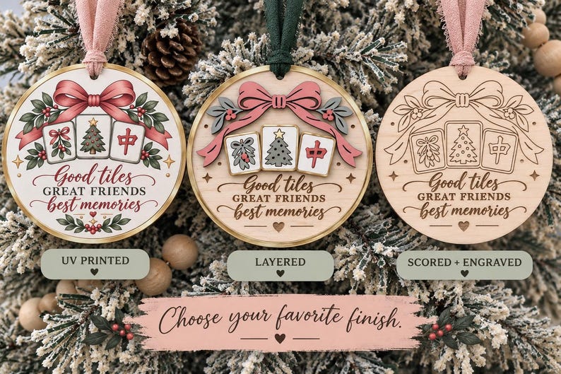 May include: Three round wooden ornaments with pink or green ribbons. Each features a bow, three mahjong tiles with holiday designs, and the text Good tiles GREAT FRIENDS best memories. The finishes include UV printed, layered, and scored and engraved.