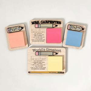 May include: A wooden desk organizer with a pencil and sticky note holder. The organizer has the text "World's Greatest Teacher" and a definition of the word "teacher". The organizer is personalized with the name "Mrs. Carpenter".
