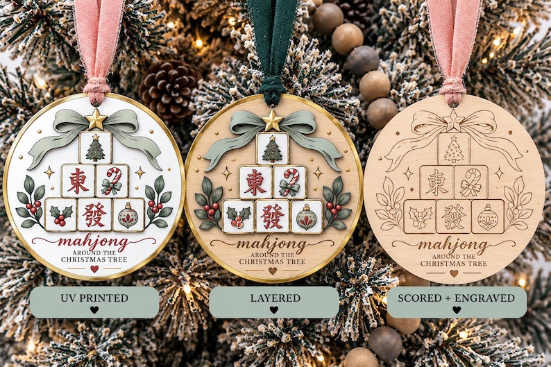 May include: Three circular ornaments with a mahjong tile design featuring a Christmas tree, candy cane, holly, and bauble. The text reads "mahjong AROUND THE CHRISTMAS TREE". One is UV printed, one is layered, and one is scored and engraved.